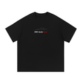 E9X AutoHaus Anti Wheel Bolt Tee front artwork on black oversized T-shirt