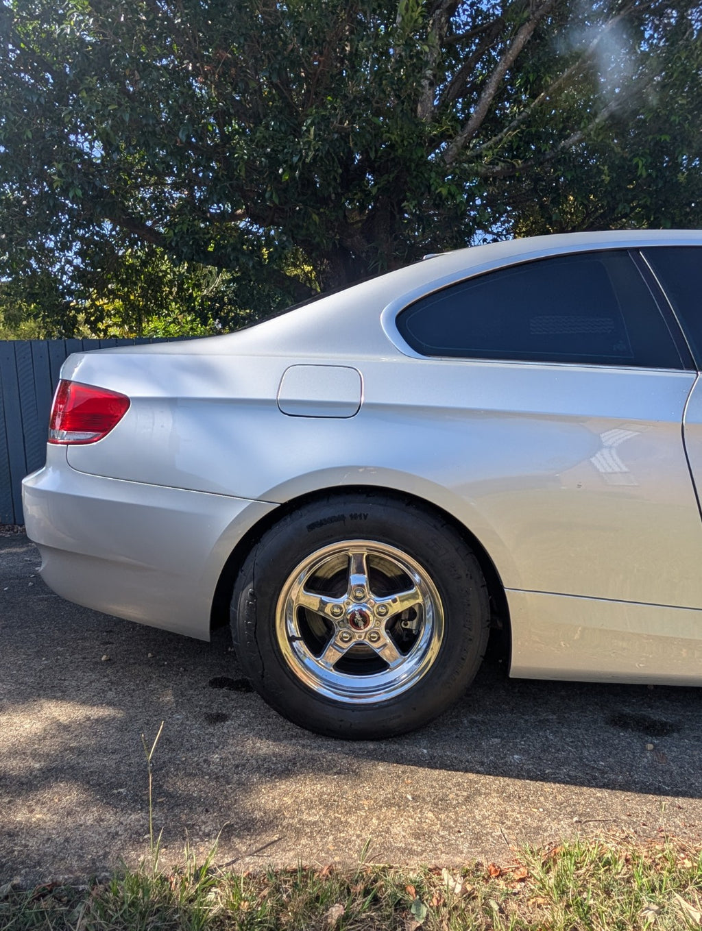 Rear wheel and tyre detail on a silver BMW E92 showing a drag-wheel setup